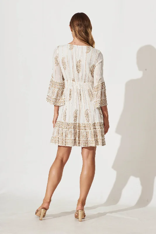 elliott-dress-in-white-with-gold-print