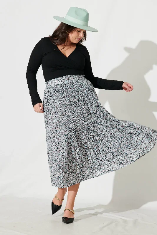 pretty-woman-pleat-skirt-in-black-with-beige-ditsy-floral