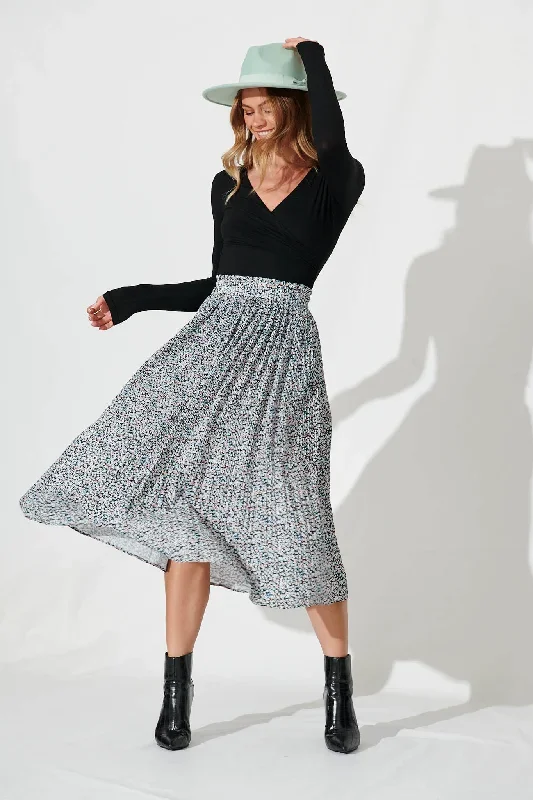 pretty-woman-pleat-skirt-in-black-with-beige-ditsy-floral