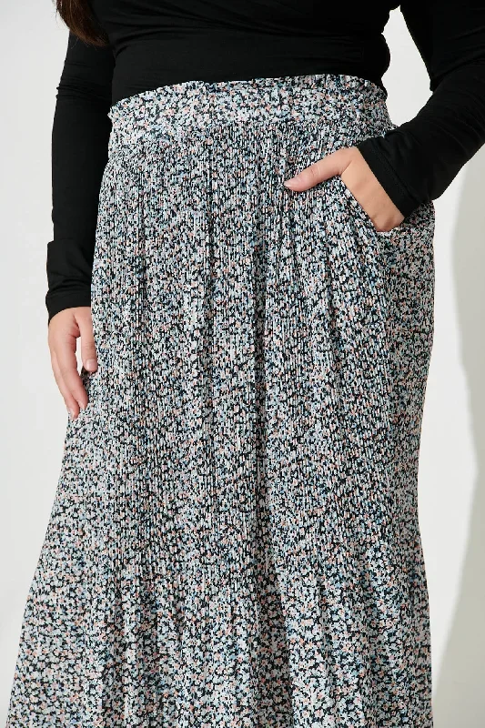 pretty-woman-pleat-skirt-in-black-with-beige-ditsy-floral